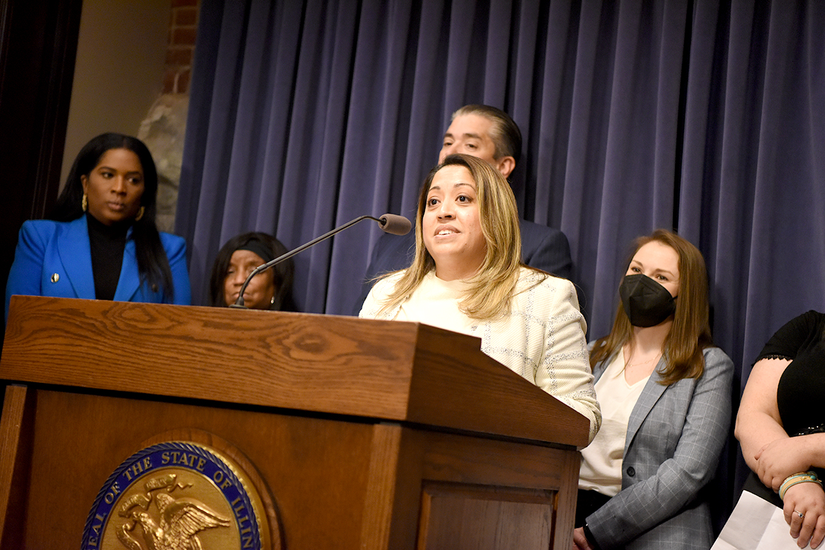 Villanueva speaking at a conference